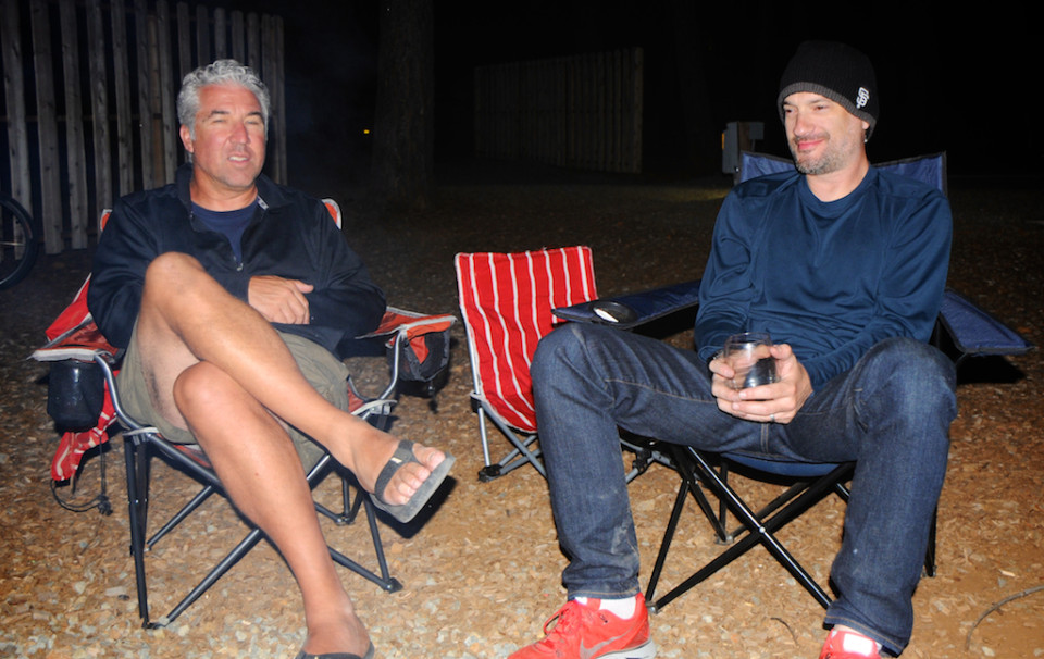 Brett (left) and Mark watching the fire burn down before calling it a night.
